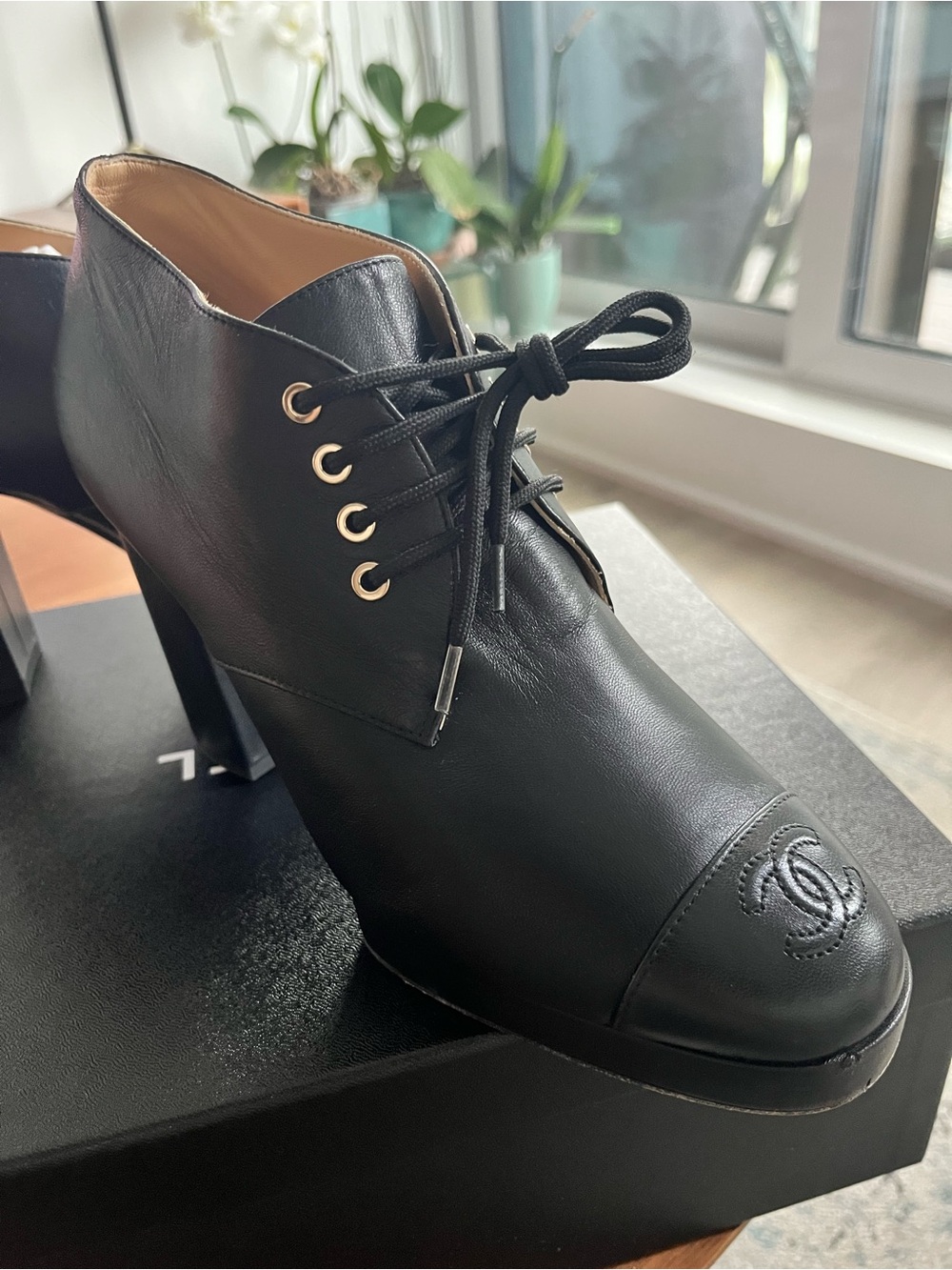CHANEL Black Leather Lace-Up Heel Booties with CC Cap Toe